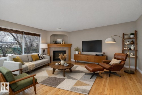 2176 Haddow Drive, Edmonton, AB - Indoor Photo Showing Living Room With Fireplace