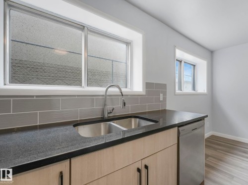 12722/24 83 Street, Edmonton, AB - Indoor Photo Showing Kitchen With Double Sink