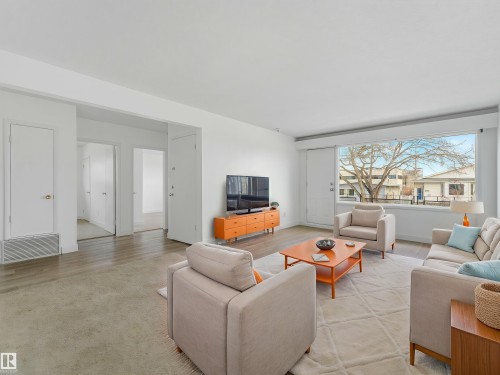 Virtually Staged - 12722/24 83 Street, Edmonton, AB - Indoor Photo Showing Living Room