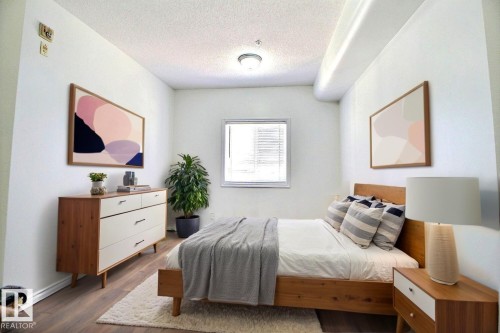 Virtually Staged - 209 10235 112 Street, Edmonton, AB - Indoor Photo Showing Bedroom