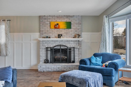 10435 39A Avenue, Edmonton, AB - Indoor Photo Showing Living Room With Fireplace