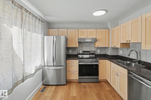 5428 146 Avenue, Edmonton, AB - Indoor Photo Showing Kitchen With Double Sink