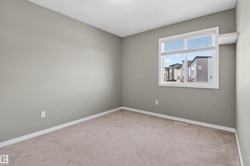 389 Simmonds Way, Leduc, AB - Indoor Photo Showing Other Room