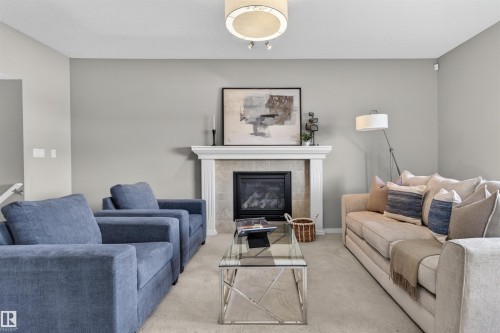 389 Simmonds Way, Leduc, AB - Indoor Photo Showing Living Room With Fireplace