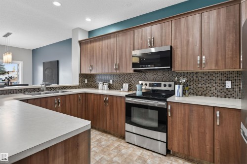 389 Simmonds Way, Leduc, AB - Indoor Photo Showing Kitchen With Double Sink