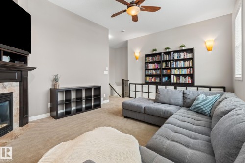 2 Longview Point(E), Spruce Grove, AB - Indoor Photo Showing Living Room With Fireplace