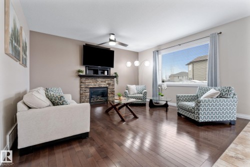2 Longview Point(E), Spruce Grove, AB - Indoor Photo Showing Living Room With Fireplace