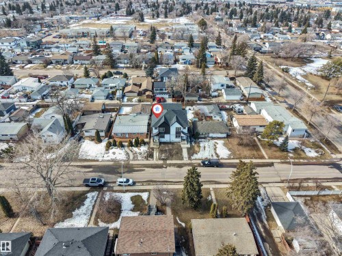Aerial view of the property with a visible street and surrounding properties, offering a perspective of the neighborhood layout - 10962 157 Street, Edmonton, AB - Outdoor With View
