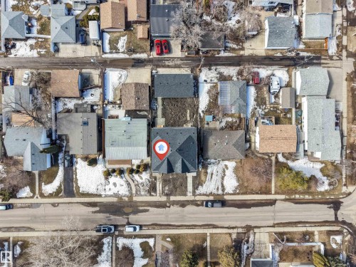 Aerial view of the property, featuring a dark-colored roof and a visible front yard - 10962 157 Street, Edmonton, AB - Outdoor With View
