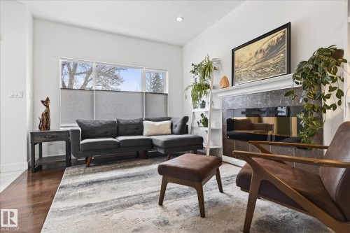 9844 80 Avenue, Edmonton, AB - Indoor Photo Showing Living Room With Fireplace