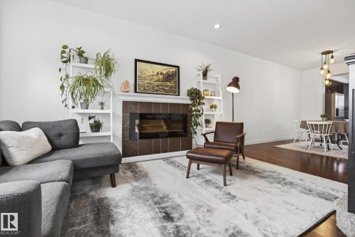 9844 80 Avenue, Edmonton, AB - Indoor Photo Showing Living Room With Fireplace