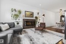 9844 80 Avenue, Edmonton, AB  - Indoor Photo Showing Living Room With Fireplace 