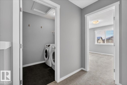 35 Prairie Gate, Spruce Grove, AB - Indoor Photo Showing Laundry Room