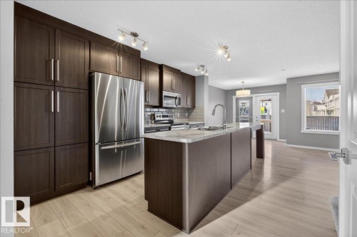 35 Prairie Gate, Spruce Grove, AB - Indoor Photo Showing Kitchen With Stainless Steel Kitchen With Upgraded Kitchen
