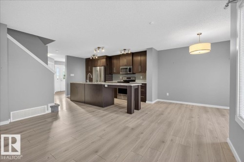 35 Prairie Gate, Spruce Grove, AB - Indoor Photo Showing Kitchen With Stainless Steel Kitchen