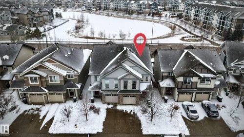 The property features a two-story design with an attached two-car garage - 3109 Carpenter Landing, Edmonton, AB - Outdoor With Facade