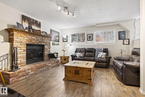 17 Lepine Place, St. Albert, AB - Indoor Photo Showing Living Room With Fireplace