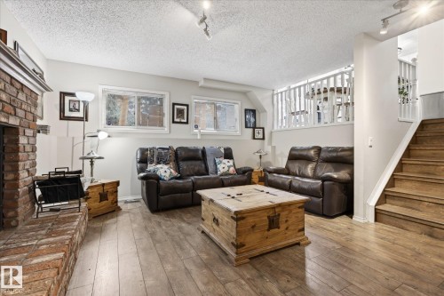 17 Lepine Place, St. Albert, AB - Indoor Photo Showing Living Room With Fireplace