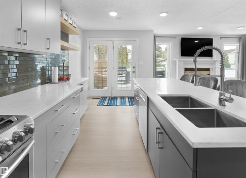 4636 151 Street, Edmonton, AB - Indoor Photo Showing Kitchen With Double Sink