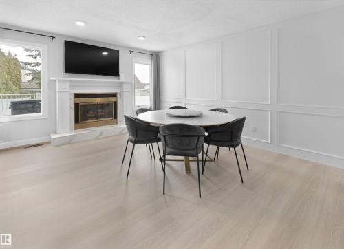 4636 151 Street, Edmonton, AB - Indoor Photo Showing Dining Room With Fireplace