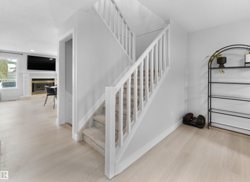 4636 151 Street, Edmonton, AB - Indoor Photo Showing Other Room With Fireplace