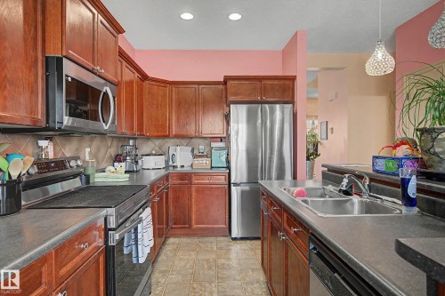 92 13825 155 Avenue, Edmonton, AB - Indoor Photo Showing Kitchen With Stainless Steel Kitchen With Double Sink