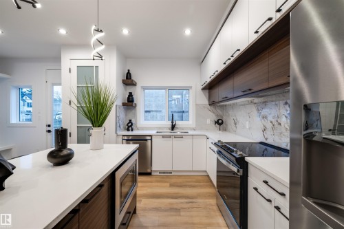 10973 74 Avenue, Edmonton, AB - Indoor Photo Showing Kitchen With Stainless Steel Kitchen With Upgraded Kitchen