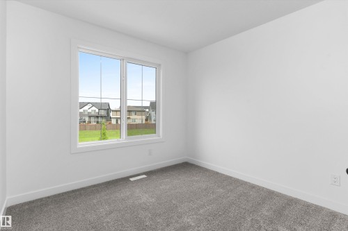 1066 Cristall Crescent Sw, Edmonton, AB - Indoor Photo Showing Other Room