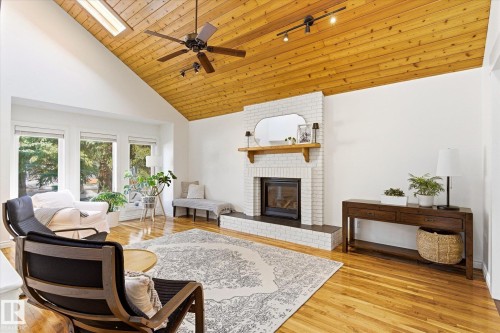 16 Perrault Place, St. Albert, AB - Indoor Photo Showing Living Room With Fireplace