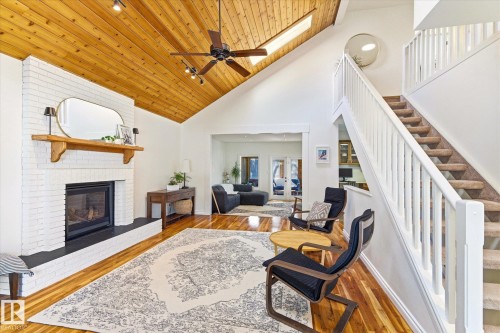 16 Perrault Place, St. Albert, AB - Indoor Photo Showing Living Room With Fireplace