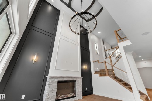 31 Eldridge Point(E), St. Albert, AB - Indoor Photo Showing Other Room With Fireplace