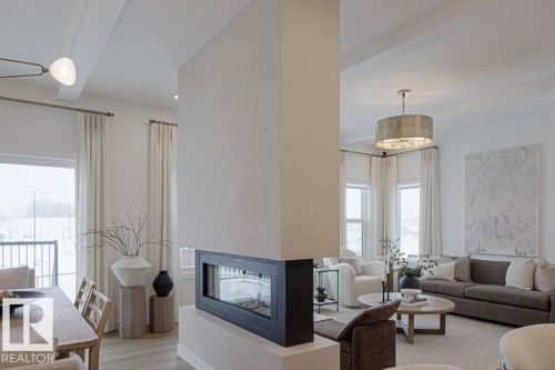 4551 Warbler Loop, Edmonton, AB - Indoor Photo Showing Living Room With Fireplace