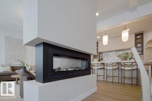 4551 Warbler Loop, Edmonton, AB - Indoor Photo Showing Living Room With Fireplace