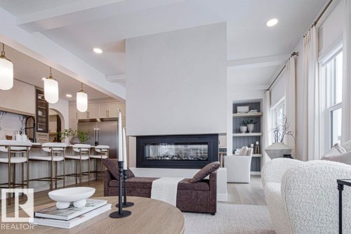 4551 Warbler Loop, Edmonton, AB - Indoor Photo Showing Living Room With Fireplace