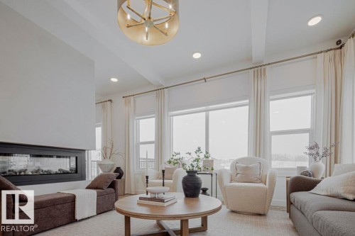 4551 Warbler Loop, Edmonton, AB - Indoor Photo Showing Living Room With Fireplace