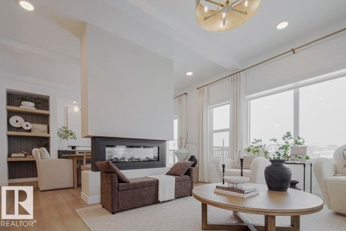 4551 Warbler Loop, Edmonton, AB - Indoor Photo Showing Living Room With Fireplace