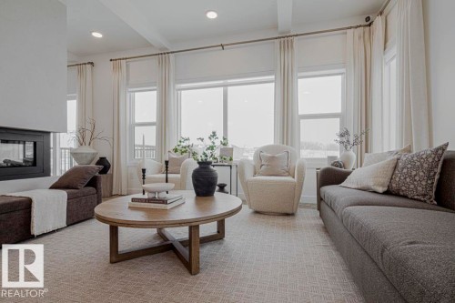 4551 Warbler Loop, Edmonton, AB - Indoor Photo Showing Living Room With Fireplace