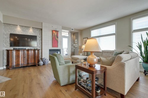 1003 9020 Jasper Avenue, Edmonton, AB - Indoor Photo Showing Living Room With Fireplace