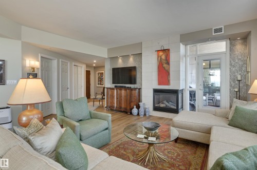 1003 9020 Jasper Avenue, Edmonton, AB - Indoor Photo Showing Living Room With Fireplace