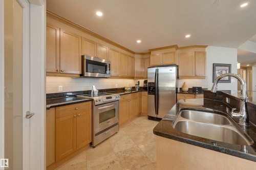 1003 9020 Jasper Avenue, Edmonton, AB - Indoor Photo Showing Kitchen With Double Sink