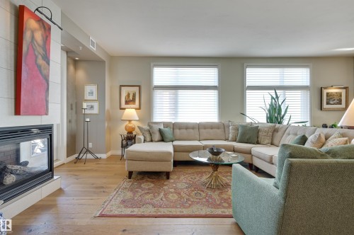 1003 9020 Jasper Avenue, Edmonton, AB - Indoor Photo Showing Living Room With Fireplace