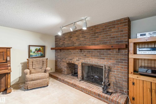 258 Greenoch Crescent, Edmonton, AB - Indoor Photo Showing Living Room With Fireplace