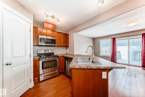 15152 33 Street, Edmonton, AB - Indoor Photo Showing Kitchen With Double Sink