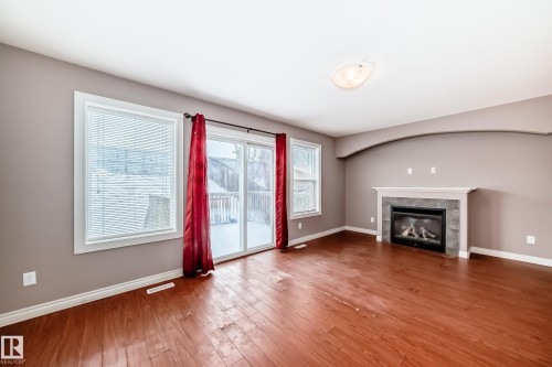 15152 33 Street, Edmonton, AB - Indoor Photo Showing Living Room With Fireplace