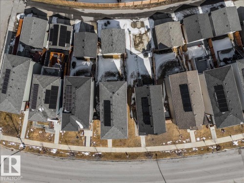 Aerial view of properties with shingled roofs and solar panels - 204 Charlesworth Drive, Edmonton, AB -  Photo Showing Basement