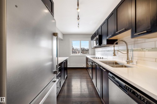 32 10015 83 Avenue, Edmonton, AB - Indoor Photo Showing Kitchen With Stainless Steel Kitchen With Double Sink