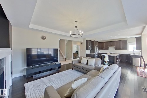 5512 64 Street, Beaumont, AB - Indoor Photo Showing Living Room With Fireplace