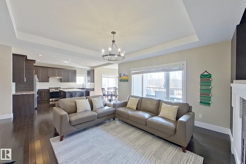 5512 64 Street, Beaumont, AB - Indoor Photo Showing Living Room With Fireplace