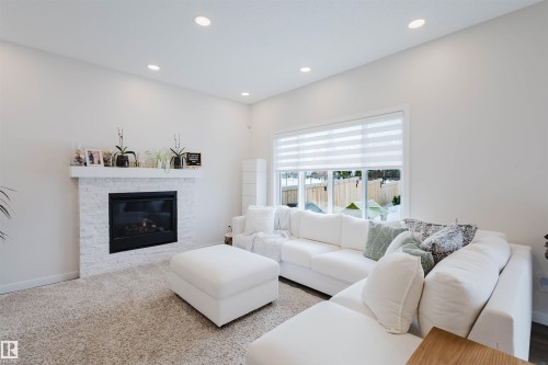3408 Checknita Terrace, Edmonton, AB - Indoor Photo Showing Living Room With Fireplace