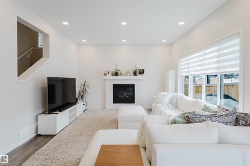 3408 Checknita Terrace, Edmonton, AB - Indoor Photo Showing Living Room With Fireplace